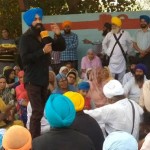 ਸੰਬੋਧਨ ਦੌਰਾਨ ਇਕਵਾਕ ਸਿੰਘ ਪੱਟੀ, ਬਲਦੇਵ ਸਿੰਘ ਸਿਰਸਾ ਅਤੇ ਹਾਜ਼ਰ ਸੰਗਤ