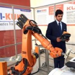 Bhavya Garg of Gulzar Group of Institutes, Khanna, Ludhiana plaing  piano by robot  which he  prepared a program copy.resized
